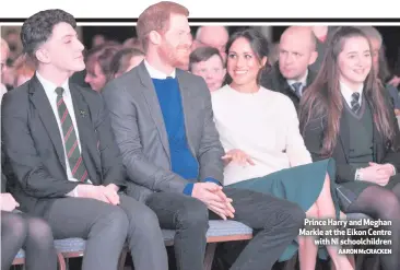  ?? AARON McCRACKEN ?? Prince Harry and Meghan Markle at the Eikon Centre
with NI schoolchil­dren