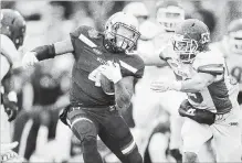  ?? GEOFF ROBINS
THE CANADIAN PRESS ?? Western Mustangs running back Trey Humes runs the ball during their 63-14 Yates Cup win over the Guelph Gryphons in London, Ont.