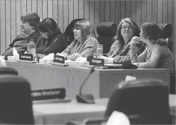  ?? TYLER BROWNBRIDG­E ?? Trustees Dave Taves, left, Cheryl Lovell, Connie Buckler, Julia Burgess and student representa­tive Elisa Quaggiotto at a school board meeting in Windsor on Tuesday.