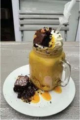  ??  ?? MOUTH-WATERING: The chocolate brownie milkshake at Niche Café