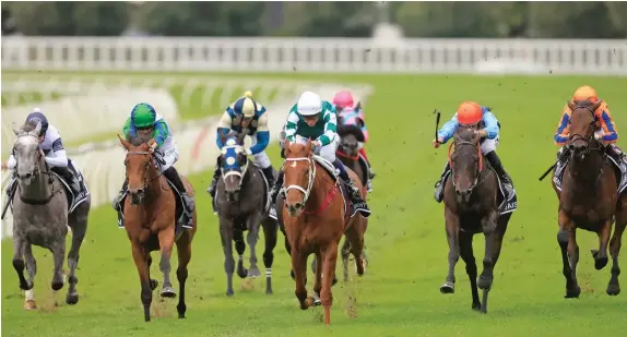  ?? Photo / Getty Images ?? Kerrin McEvoy on Hungry Heart wins the Australian Oaks at Royal Randwick yesterday. Kiwi horse Amarelinha (far right) finished fourth.