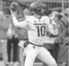  ?? JAY LAPRETE/AP ?? Michigan State quarterbac­k Payton Thorne throws a pass against Ohio State on Saturday in Columbus, Ohio.