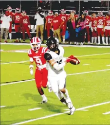  ?? ?? Blackhawk junior Austin James, a 6-feet-3, 195-pound wide receiver, makes a reception on Friday, Oct. 28. Farmington defeated the Blackhawks 49-16 in a 5A West football game at Farmington’s Cardinal Stadium.