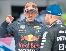  ??  ?? Max Verstappen with Valtteri Bottas at Silverston­e.