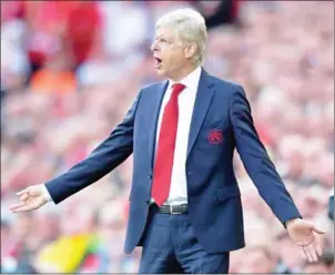  ?? ANTHONY DEVLIN/AFP ?? Arsenal manager Arsene Wenger gestures on the touchline during his sides English Premier League match against Liverpool at Anfield on August 27. The Gunners lost the game 4-0.