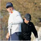  ?? Photo / AP ?? Ian Poulter, front, and Rory Mcilroy in Austin yesterday.