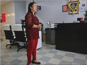  ??  ?? Ramba Regmi, an immigrant from Nepal and a business woman, stands inside her salon as she waits for customers to arrive in New York on Wednesday. AP PHOTO/BEBETO MATTHEWS