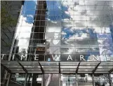  ?? Mark Lennihan / Associated Press ?? Telecom giant AT&T wants to acquire media giant Time Warner to create a vertically integrated megacorpor­ation.