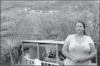  ?? AP/DANICA COTO ?? “You have no idea what it’s like to gulp in that smell 24 hours a day, 365 days a year,” said Yahaida Porrata, whose house is next to a landfill in Toa Baja, Puerto Rico.