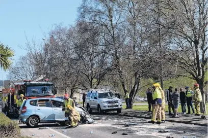  ?? PHOTO: LINDA ROBERTSON ?? Incident scene . . . The Honda hatchback which rolled several times in Kaikorai Valley Rd yesterday afternoon, leaving the driver seriously injured.