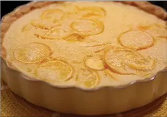  ?? TNS ?? ALL IN: Lemon Shaker tart uses lemon slices, peel and all, for a tart dessert.