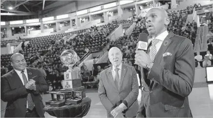  ?? Rene Johnston Toronto Star ?? RETIRED VETERANS are carving out new careers in the G League, including Jerry Stackhouse, right, the league’s 2016-17 coach of the year. The Raptors 905 coach is shown speaking at an event attended by Malcolm Turner, left, president of the league.