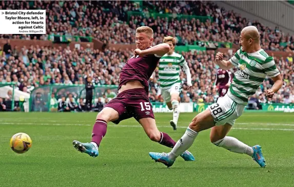  ?? Andrew Milligan/PA ?? Bristol City defender Taylor Moore, left, in action for Hearts against Celtic