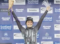  ??  ?? 0 Leah Thomas of the USA celebrates her Tour of Scotland victory.