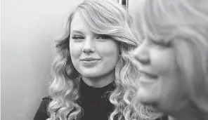  ??  ?? Taylor Swift and her mom Andrea in New York City on Nov. 10, 2008, the day before her “Fearless” was released in 2008. TODD PLITT/ USA TODAY