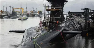  ??  ?? HMS Vigilant, one of Britain’s four nuclear-armed submarines, at Faslane