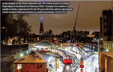  ?? FRASER HAY. ?? In the shadow of the Shard, Bakerloo Line 1972 Stock arrives at London Road depot in Southwark on February 8 2021. Transport for London is unable to fund a replacemen­t for the 50-year-old trains until an agreement can be reached with government on capital investment.