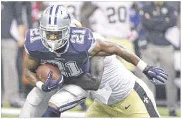  ?? MAX FAULKNER / FORT WORTH STAR-TELEGRAM ?? Joseph Randle (21) has minus-4 yards rushing combined in the second half of the Cowboys’ past two losses. His nearfumble at the goal line Sunday night got him benched for the fourth quarter.