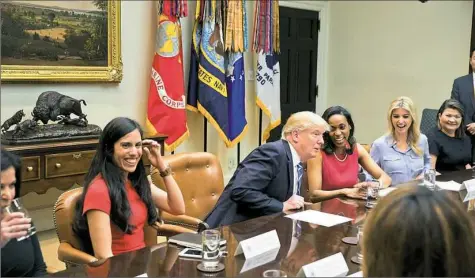  ?? Stephen Crowley/The New York Times ?? Ivanka Trump, second from right, laughs during a meeting Monday with her father, President Donald Trump, and female small business owners in the Roosevelt Room of the White House in Washington, D.C.