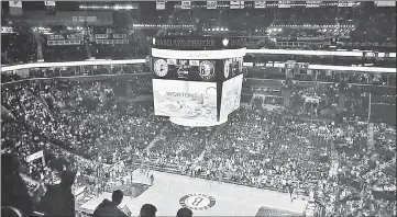  ??  ?? A Wonton Food commercial shot by Jonathan is screened during the NBA Brooklyn Nets half-time show.