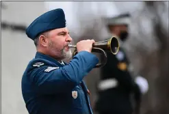  ?? CP PHOTO SEAN KILPATRICK ?? The rouse is played during the Remembranc­e Day ceremony at the National War Memorial in Ottawa on Wednesday.