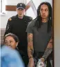  ?? AP ?? WNBA star and Olympic gold medalist Brittney Griner is escorted to a courtroom in Khimki, Russia, on Monday.