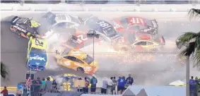  ?? CHRIS O’MEARA/ASSOCIATED PRESS ?? Multiple cars collide during a 21-car crash during the NASCAR Daytona 500 at Daytona Internatio­nal Speedway on Sunday.