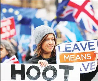  ??  ?? In this file photo, demonstrat­ors protest for Britain’s Brexit split from Europe, outside the Houses of Parliament inLondon. (AP)