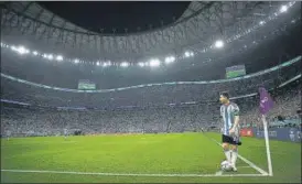  ?? REUTERS ?? Argentina’s Lionel Messi takes a corner at the Lusail Stadium in Qatar during a Group C match against Mexico. A Messi goal helped Argentina win 2-0 to climb to second place in the group. A win on Wednesday against Poland will now carry the side into the knockout stages.