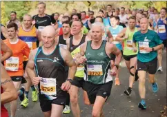  ?? ?? John Mcdonnell receving care in the Stroke Unit at the SWAH, and (right) in peak fitness running in a marathon.