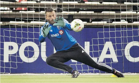  ?? GRAHAM HUGHES/THE CANADIAN PRESS ?? Impact goalkeeper Kristian Nicht makes a save during a training session on Tuesday ahead of the team’s CONCACAF Champions League final game against Mexico’s Club America on Wednesday night at Olympic Stadium.