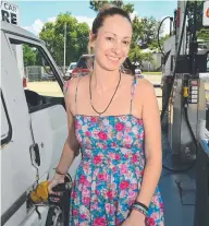  ?? CAMPAIGN CONTINUES: Claire Lamont fills up at the Belgian Gardens Shell service station. ??