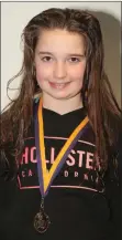  ??  ?? Ciara Bethall of Adamstown, Under-14 breaststro­ke winner.