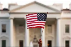  ?? ASSOCIATED PRESS ?? In this September 2017 file photo, a flag is waved outside the White House in Washington.
