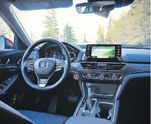  ??  ?? The interior of the 2018 Honda Accord is sleek and well-fitted.