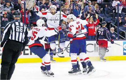  ?? — GETTY IMAGES ?? Brett Connolly jumps for joy after teammate Lars Eller scored in double overtime to give the Caps a 3-2 win on the road in Game 3 of their series against the Columbus Blue Jackets Tuesday.