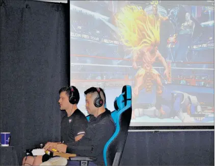  ??  ?? Left, Llyod Stockman bested Michael Kouk for the Street Fighter V’s fourth place round.