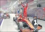  ?? AFP ?? ■ Ferrari's Sebastian Vettel celebrates his victory atop his car at the Singapore Grand Prix on Sunday.