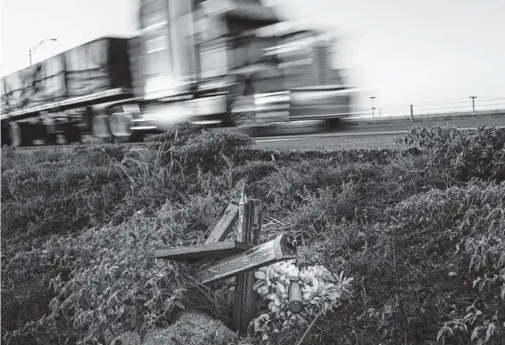  ?? Jon Shapley / Staff photograph­er ?? A broken and faded cross marks the spot on Texas 6 in Waco where Stetson Hoskins killed himself in January 2020. Stetson’s mom made the cross by hand.