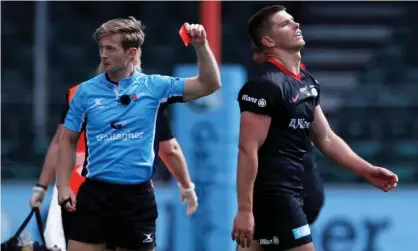  ?? Photograph: Paul Childs/Action Images ?? Saracens fly-half Owen Farrell is sent off for a foul on Charlie Atkinson during the match against Wasps – the first red card of his career.