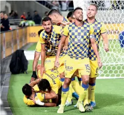  ?? (Danny Maron) ?? DEFENDING CHAMPION Maccabi Tel Aviv has not lost a beat, sitting atop the Israel Premier League standings a quarter of the way throught the season.