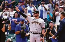  ?? Nam Y. Huh / Associated Press ?? Kris Bryant got emotional as he was cheered by Cubs fans before the game. Chicago traded Bryant on July 30.