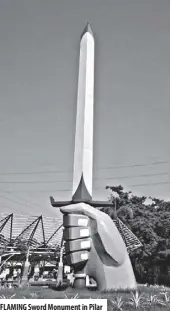  ??  ?? FLAMING sword Monument in Pilar