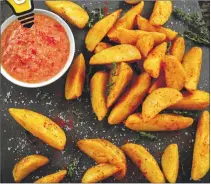  ??  ?? Make perfect, profession­allooking fried potato wedges in a snap using an apple slicer.