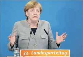  ?? Focke Strangmann EPA/Shuttersto­ck ?? MERKEL’S failure to find a willing parliament­ary coalition partner for her conservati­ve party had raised alarm, but a center-left group is stepping up.