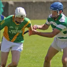  ??  ?? Brian O’Neill (Rathgarogu­e-Cushinstow­n) and Bob Jacob (Shamrocks) in a duel for possession.