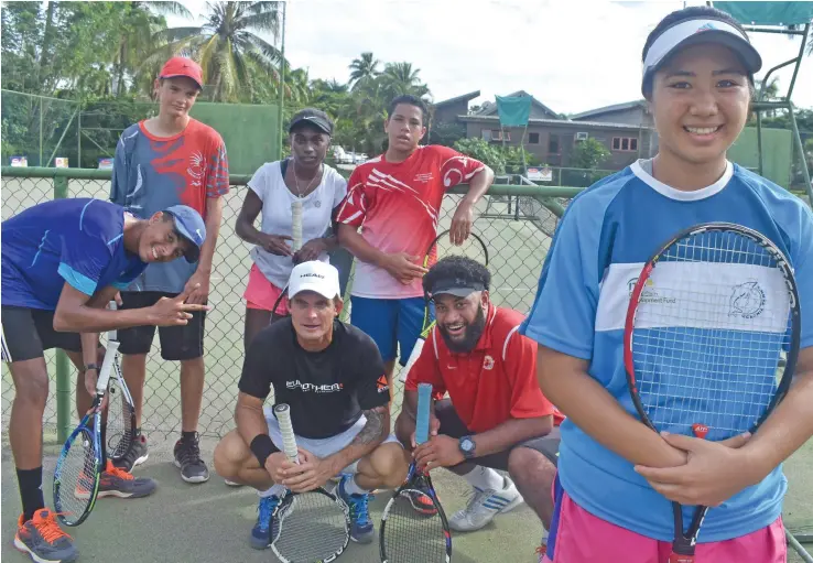  ?? Photo: Waisea Nasokia ?? Fiji’s Mulan Kamoe (right) with tennis players at the Denarau Golf and Racquet Club on May 21, 2018.
