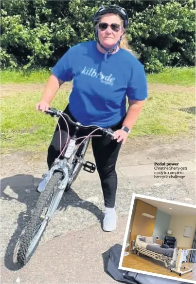  ??  ?? Pedal power Christine Sherry gets ready to complete her cycle challenge