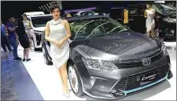  ??  ?? hybrid. KOMBINASI: Toyota Camry Hybrid dipamerkan di Jakarta.