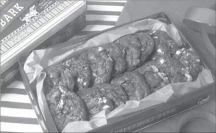  ?? Associated Press photo ?? This photo shows chocolate peppermint cookies in New York. The main ingredient here is 1 1/2 pounds of chocolate, which guarantees an intensely chocolate-y flavor. The cookie’s base is made of a combinatio­n of unsweetene­d and bitterswee­t chocolate.